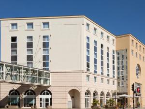 a rendering of the front of a building at ibis Vichy in Vichy