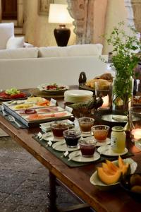 a table full of food on top of a table at Château de Chavigny in Chambourg-sur-Indre +43 photos