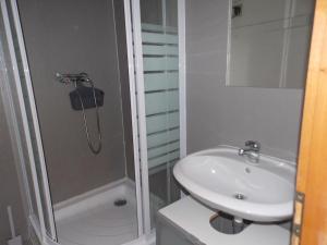 a white bathroom with a sink and a shower at carpedieme in Horní Brusnice +27 photos