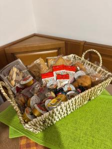 a basket filled with different types of food on a table at La casetta di Nino in Termoli +13 photos
