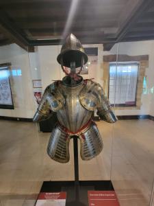 a mannequin in a suit and helmet on display in a museum at Château des Princes " Calme et sérénité au cœur de Sedan " in Sedan