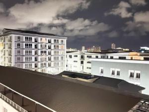 a view of a city skyline with white buildings at Pc Luxury 1 bedroom with pool in Lagos