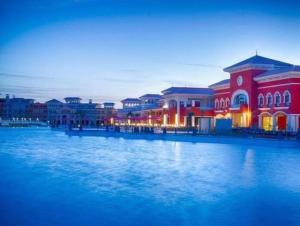 a group of buildings next to a body of water at Chalet in sharm el shekh in Sharm El Sheikh