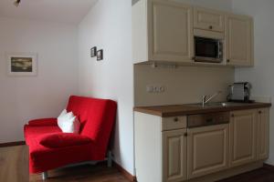 Kuchyň nebo kuchyňský kout v ubytování Appartements Haus Rötelstein
