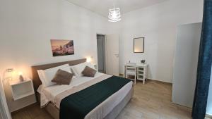 a bedroom with a large bed in a room at Mare Apartment in Nocera Inferiore +43 photos