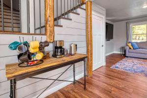 a room with a table with a coffee maker on it at Westeros by Simple Life Rentals in Ephraim +17 photos