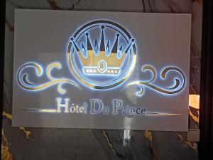 a sign for a hotel dh prince at HOTEL DU PRINCE Bingerville in Bingerville +8 photos
