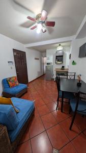a living room with a couch and a table at Villa Stahl in San Salvador