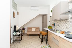 a kitchen with a sink and a counter top at GrandPa's House in Sorrento