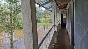an outside view of a house with a flooded porch at Macedonia Lodge in Macedonia +2 photos