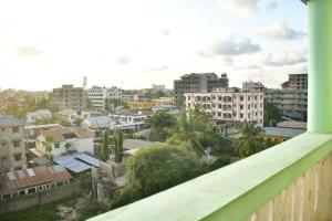 a view of a city from a balcony at Oceanic Homes in Mombasa