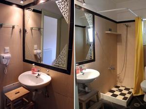 a bathroom with two sinks and a shower at Ktima Anastasia Olive Grove Nafplio in Nafplio +26 photos