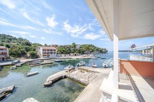 a view of a marina with boats in the water at Apartments by the sea Grscica, Korcula - 169 in Prizba