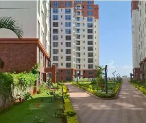 an empty street in a city with tall buildings at Spectacular 3 bedroom apartment in Syokimau