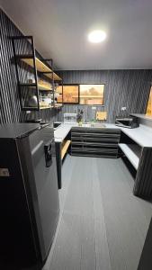 a kitchen with a sink and a counter top at Leha's Apartaments in Buenos Aires