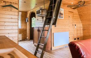 a ladder in a tiny house with a kitchen at 2 Bedroom Nice Home In Bad Lobenstein in Bad Lobenstein