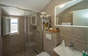 a bathroom with a shower and a sink at Villa Beachfront Korcula in Vela Luka