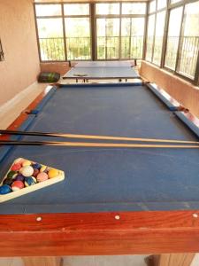 a pool table with a in a room at عمان in Az Zarqa