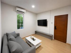 Televisor o centre d'entreteniment de Crown Residence Family Room