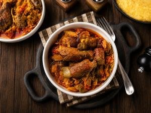 a table topped with two bowls of food with meat at Casa Dives - Varianta Boierească in Pianu de Sus +94 photos