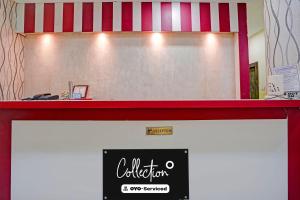 a counter in a restaurant with a sign on it at Super Collection O Dalhousie Square Kolkata Formerly G.N Palace in Calcutta Bara Bazar