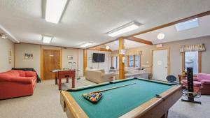 a living room with a pool table in it at Arena by AvantStay in North Creek