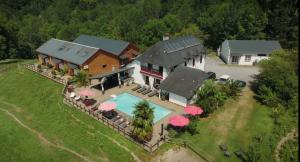 an aerial view of a house with a swimming pool at Gîtes ETCHE ARGUINIA in Montory