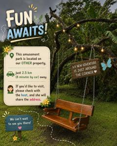 a sign for a fun swings in a garden at Forest Garden House in Monteverde Costa Rica +53 photos