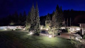 an aerial view of a yard at night at Rancho Laaxdeluxe in Laax