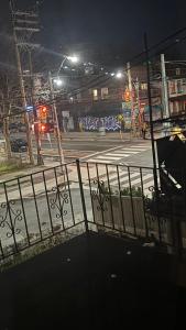 a view of a city street at night at Casa Toronto in Toronto