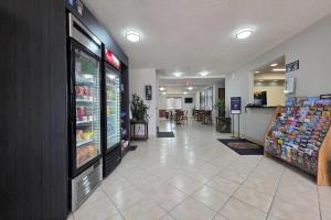 a grocery store aisle with a food display in a store at Super 8 by Wyndham Fountain in Fountain
