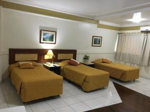 Postel nebo postele na pokoji v ubytování Tamareiras Park Hotel + 31 fotografií