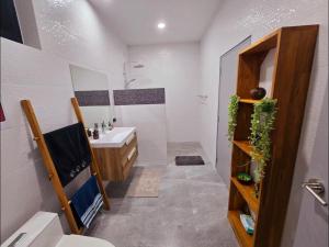 a bathroom with a sink and a toilet in it at Villa des Princes in Ban Thung +38 photos