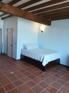 a bedroom with a bed in a room at Campo Rivera Beach Community in La Misión