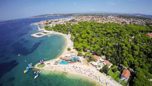 an aerial view of a beach with a crowd of people at Apartment Tome in Biograd na Moru