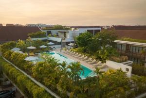 an aerial view of a resort with a swimming pool at The Aviary Hotel in Siem Reap