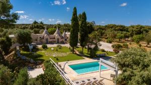 an aerial view of a estate with a swimming pool at Trullo Theodoro Puglia in Ceglie Messapica