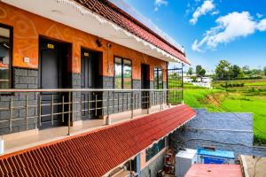 an image of a building with a balcony at Lake Residency Ooty in Ooty