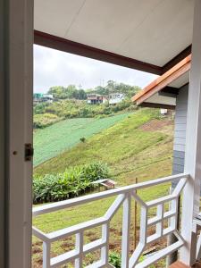 a view from the balcony of a house at บ้านพักสมพงศ์ภูทับเบิก in Ban Maeo Thap Boek