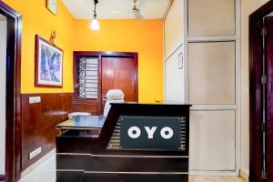 an office with an ovo sign on a desk at Hotel O Le Regent in Gurgaon