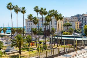 a view of a city with palm trees and buildings at Waterfront Riviera in Naples