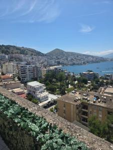 a view of a city from the roof of a building at Comfort Saranda Apartment in Sarandë