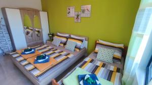 a model of a bedroom with two bunk beds at Apartmani Anastazija in Karlobag +45 photos