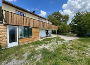 a house with a large yard in front of it at T4 avec jardin - ENVEITG in Enveitg