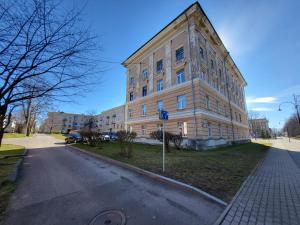 a large building on the side of a street at Keskallee Charm in Kohtla-Järve +3 photos