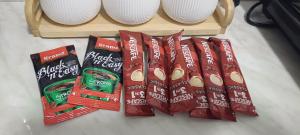 a group of bags of chips sitting on a table at Green view apartman Pančevo in Pančevo