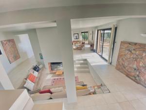 a living room with a couch and a table at Casa Altura in Coti-Chiavari +137 photos