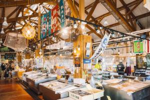a store with a lot of items on display at Tanakaya in Kurobe