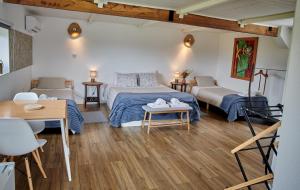 a bedroom with a bed and a desk and a table at Quinta Da Estrada Winery Douro Valley in Peso da Régua +197 photos