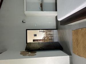 a room with a mirror on the wall at One Bhakthi in Ahangama +86 photos